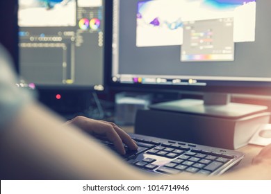 post production - man doing photo and video editing on computer