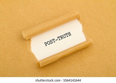 Post Truth Word Written Under Torn Paper.