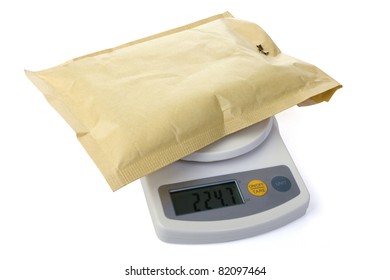 Postal Scale With Letter Over White