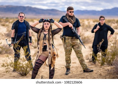 In A Post-apocalyptic Desert Wasteland, A Queen Of The Apocalypse Leads Her Militia Against The Enemy. Armed To The Teeth, Who Will Win? Post Apocalyptic Themed And Shot In The California Desert