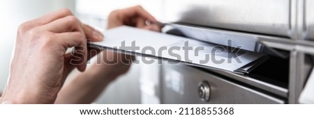 Postbox Envelope Mail Delivery. Inserting Letter In Mailbox
