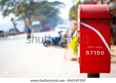 postbox , the roadside in Thailand , traditional thailand red letter box