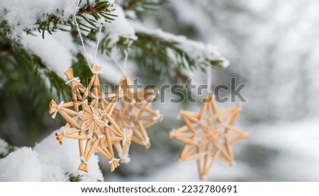 POSTCARD of Christmas and New Year decorations: fir branches IN THE SNOW, Christmas tree decorations HANDMADE FROM STRAW Stock photo © 