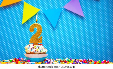 Postcard with number 2 for any holiday or anniversary. Happy birthday cupcake cream with number two copy space. happy birthday background decoration