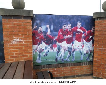 A Poster Of The 2008 Champions League Finalists Outside The Manchester United Stadium.

Manchester, May 18, 2019