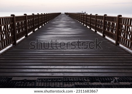 Poster design of a pier over the sea, wooden construction like a bridge