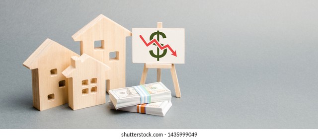 Poster with down arrow and wooden houses. The concept of falling real estate market. Reduced interest in the mortgage. A decline in property price. Low interest rates on loans. Drop in demand