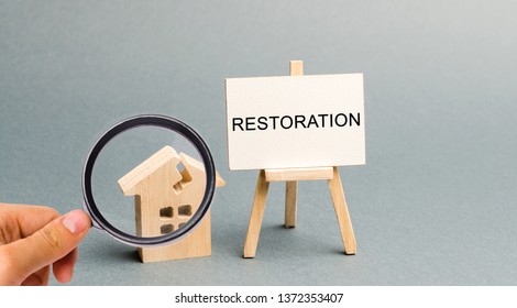 A Poster With The Inscription Restoration And A Broken Wooden House. Repair Secondary Housing. The Process Of Improvement, Reconstruction Of The Home. Recovery After A Fire Or Natural Disaster