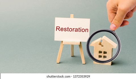 A Poster With The Inscription Restoration And A Broken Wooden House. Repair Secondary Housing. The Process Of Improvement, Reconstruction Of The Home. Recovery After A Fire Or Natural Disaster