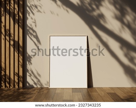 Poster picture frame mockup on wooden tiles floor with aesthetic shadow