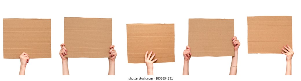 Posters of cardboard in his hands. Isolated on white. Set. Copy space. - Shutterstock ID 1832854231