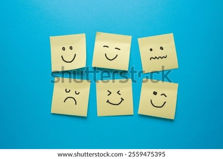 Post-it or Sticky notes with different sad and happy emotions