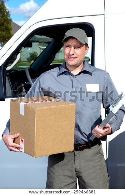 Postman with\
parcel box. Postal delivery\
service.
