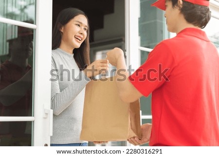 Postman, service shopping online asian young woman, girl hand received order, delivery man, male holding, carrying paper bag send to customer house. Deliver, courier bring product to doorway at home.
