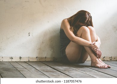 Posttraumatic stress disorder,International Day for the Elimination of Violence Women, Sexual harassment human trafficking, sad woman sit alone feeling bad.