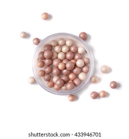 A pot of bronzing pearl make up, isolated on a white background