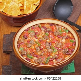 Pot Of Chili With Beans And Chips In Background