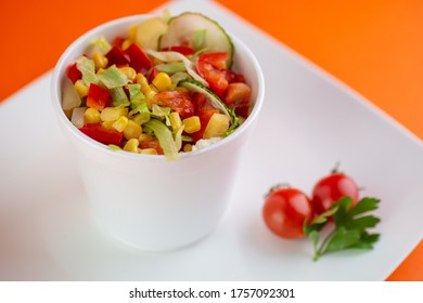 A Pot Of Delicious Greek Salat Isolated On A White  Plate