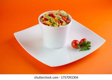 A Pot Of Delicious Greek Salat Isolated On A White  Plate