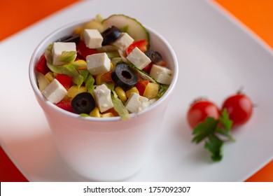 A Pot Of Delicious Greek Salat Isolated On A White  Plate