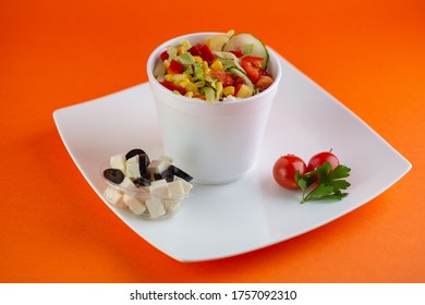 A Pot Of Delicious Greek Salat Isolated On A White  Plate