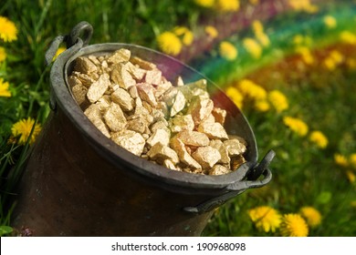 Pot Of Gold With Rainbow In A Meadow