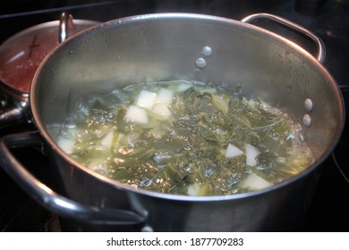 Pot Of Green On Stovetop Cooking