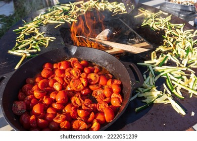 Pot Of Grilled Cherry Tomatoes And Courgettes.