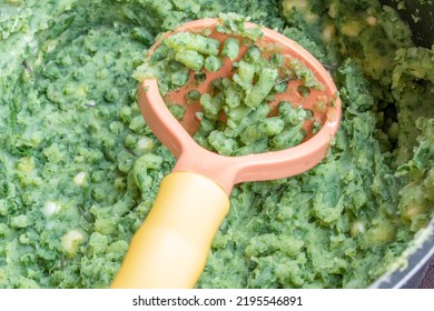 A Pot Of Mukimo With A Potato Masher. Mukimo Is A Traditional Food From Kenya.