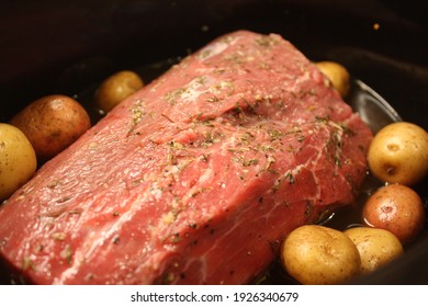 Pot Roast Dinner With Vegetables In The Crockpot