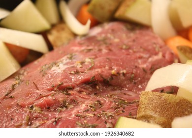 Pot Roast Dinner With Vegetables In The Crockpot