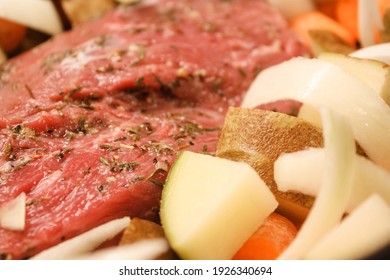 Pot Roast Dinner With Vegetables In The Crockpot