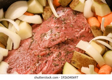 Pot Roast Dinner With Vegetables In The Crockpot