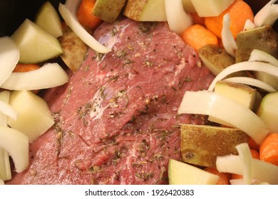 Pot Roast Dinner With Vegetables In The Crockpot