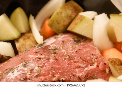 Pot Roast Dinner With Vegetables In The Crockpot