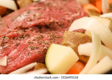 Pot Roast Dinner With Vegetables In The Crockpot