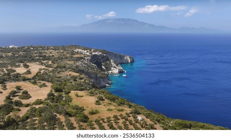 Potamitis, Greece. Drone view of a rocky coastline, showcasing a dynamic interaction between land and sea. The landscape features various coastal and oceanic landforms, including sandy beaches. - Powered by Shutterstock