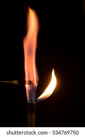 Potassium Permanganate Burning In Air With Lilac Flame. Bunsen Burner With Salt Combusting In Flame, Showing Distinctive Color Produced