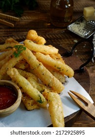 Potato Cheese Stick Or Long Potato Cheese On Rustic Bowl. Now It’s Popular Snack In Indonesia. Fried Crispy Nutritious Cheese Or Potato Sticks. Snacks For Beer And Hamburger. Oily.
