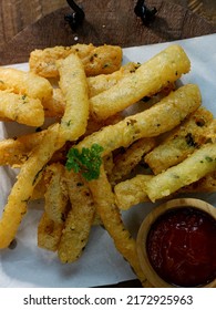 Potato Cheese Stick Or Long Potato Cheese On Rustic Bowl. Now It’s Popular Snack In Indonesia. Fried Crispy Nutritious Cheese Or Potato Sticks. Snacks For Beer And Hamburger. Oily.
