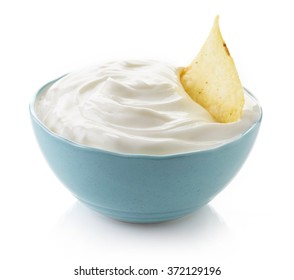 Potato Chip In Bowl Of Dip On White Background
