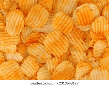 Potato chips with bbq sauce. Background and texture. Full frame.