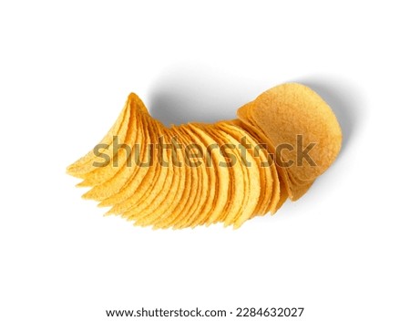 Potato chips of a beautiful identical shape isolated on a white background close-up top view. Junk food, beer snacks.