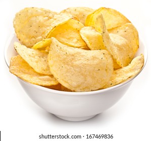 Potato chips in a bowl on a white background.