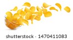Potato chips falling into glass bowl isolated on white background with clipping path, flying potato crisps