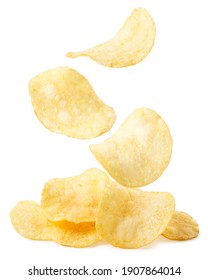 Potato chips are falling on a heap on a white background. Isolated