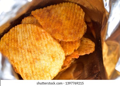 Potato Chips Inside Bag, Close Up, Unhealthy Food.