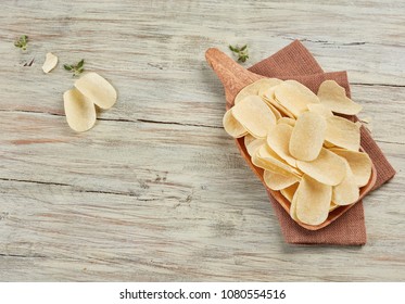 Potato chips on table