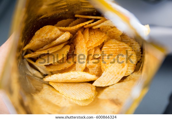 Potato chips is snack\
in bag ready to eat and fat food or junk food., Potato Chips in a\
Ready-to-Eat Bag.