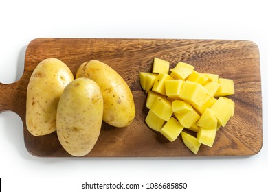 potato dice on wood plate